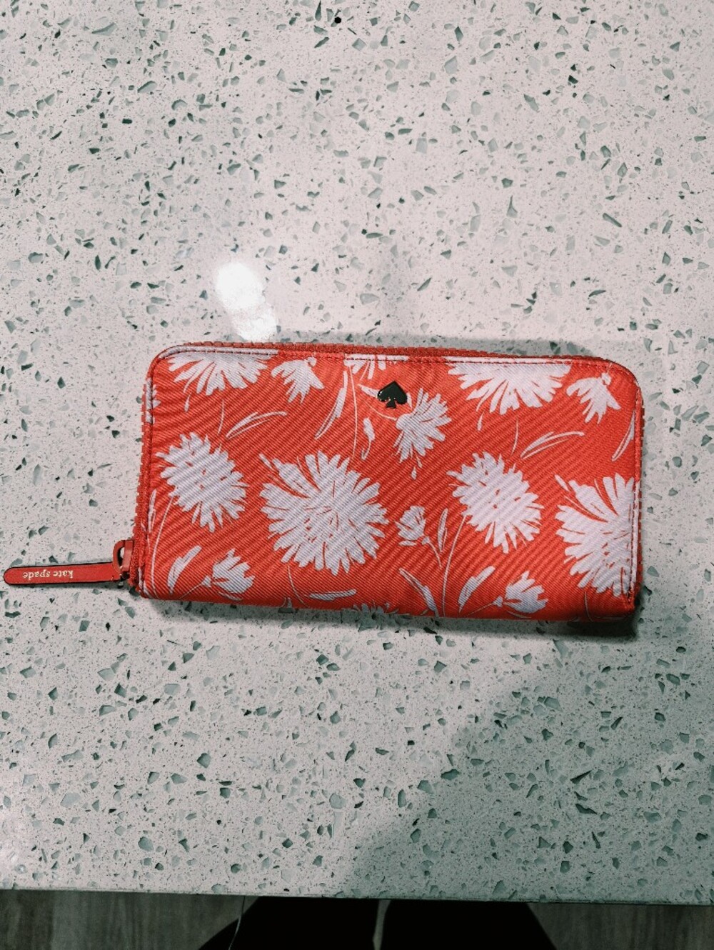 kate spade new york Women’s Orange/White Floral Canvas Zip-Around Wallet Logo